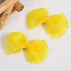 KCHIES Organza double bow clip adds elegant sparkle to hairstyles.
