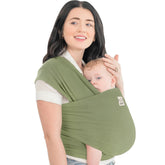 KeaBabies wrap carrier in dusty olive in use, enabling hands-free bonding on the go.