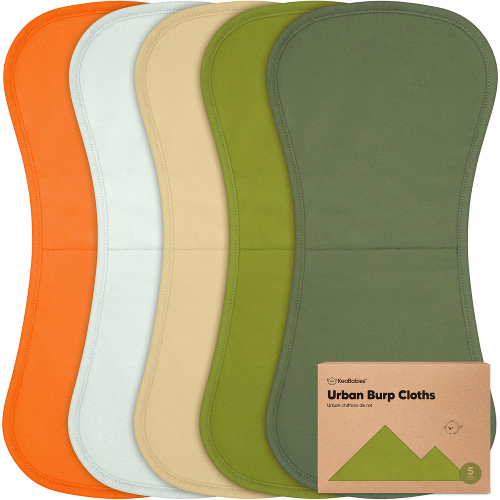 KeaBabies organic burp cloths 5-pack providing full shoulder coverage during feeds.
