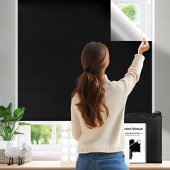 Keeswin blackout blinds installed in a bedroom for privacy and darkness.