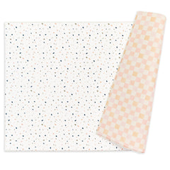 Keiki Care reversible play mat with dual designs for versatile play spaces.
