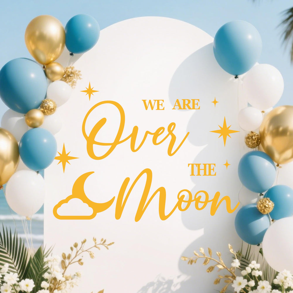 KEWUFD We're Over The Moon wall decal adds shimmering moon-themed focal point for baby showers