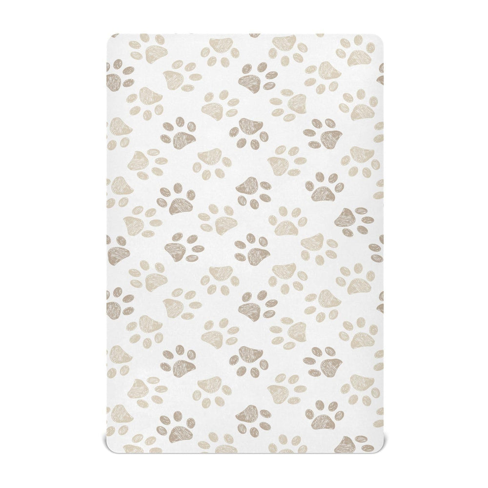 KICPOAY fitted sheets with dog paw prints pattern for baby's cozy crib.