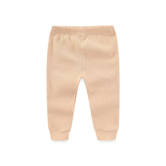 Kiddiezoom newborn layette on model showing unisex design.