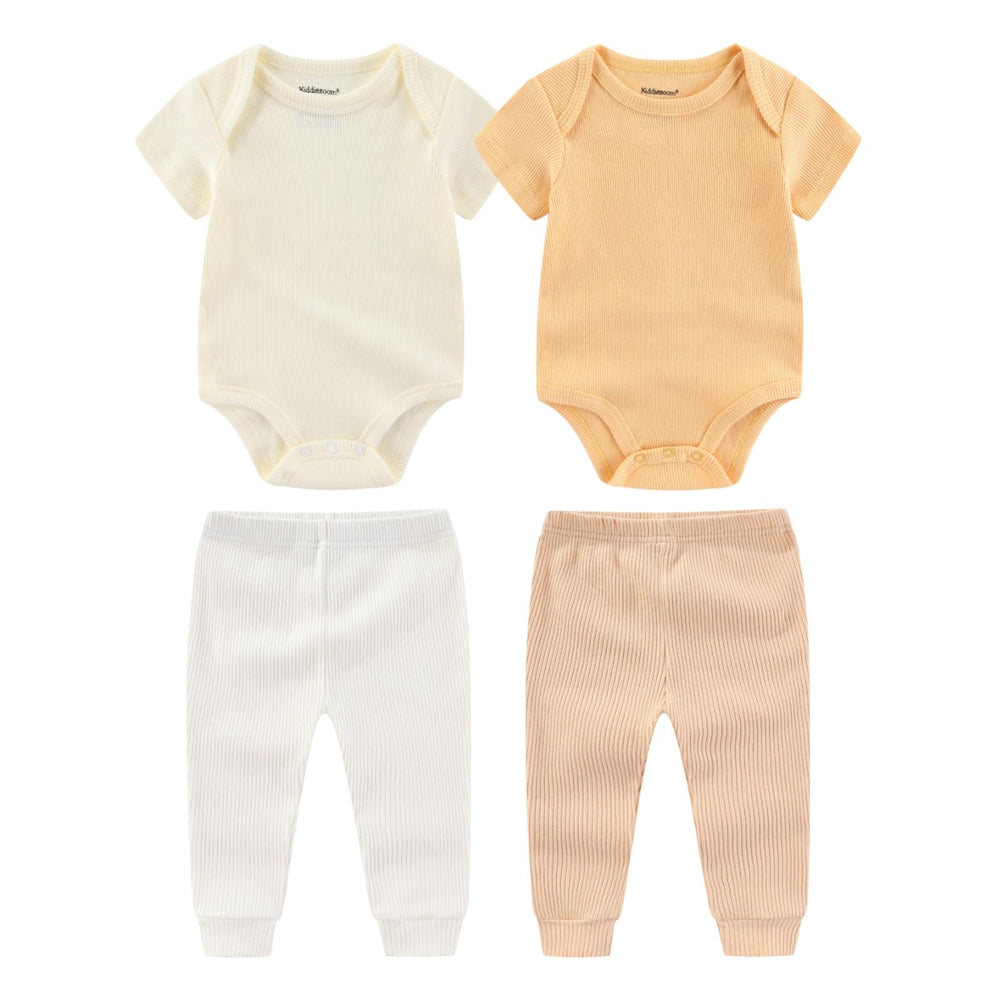 Kiddiezoom newborn layette close-up of soft cotton fabric.