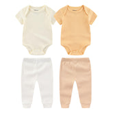 Kiddiezoom newborn layette close-up of soft cotton fabric.