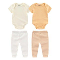 Kiddiezoom newborn layette close-up of soft cotton fabric.