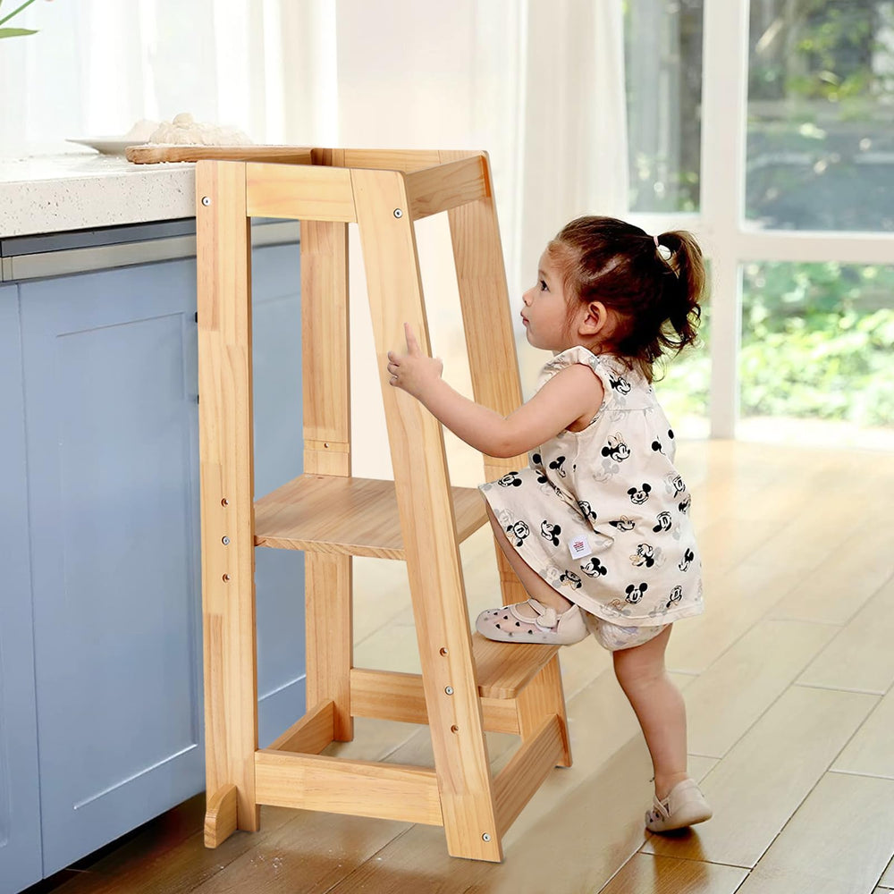 KIDINIX solid wooden toddler standing tower with 3-height adjust promotes independent kitchen tasks.