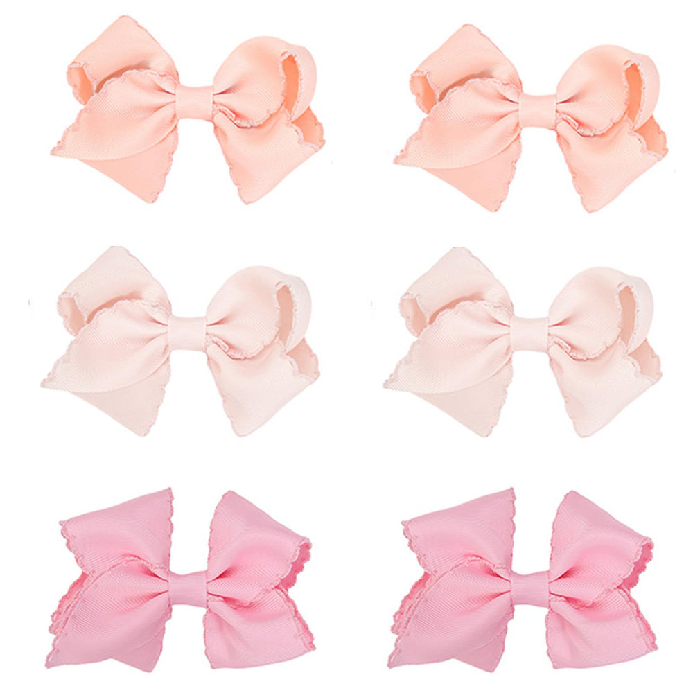 KIDOCHEESE baby hair bows clip set in three colors for secure all-day wear.
