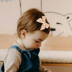 Kidocheese secure-grip base clip keeps little ones' hair tidy all day.