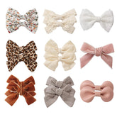 KIDOCHEESE baby hair clips fully lined provide gentle, secure grip for delicate hair.