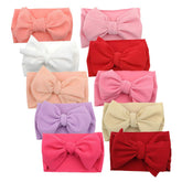 KIDOCHEESE big bows headband with a 6-inch bow for everyday wear.