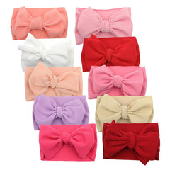 KIDOCHEESE big bows headband with a 6-inch bow for everyday wear.