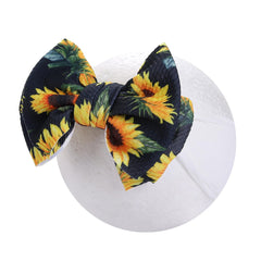 KIDOCHEESE Big Bows navy headband, secure yet gentle all-day wear.