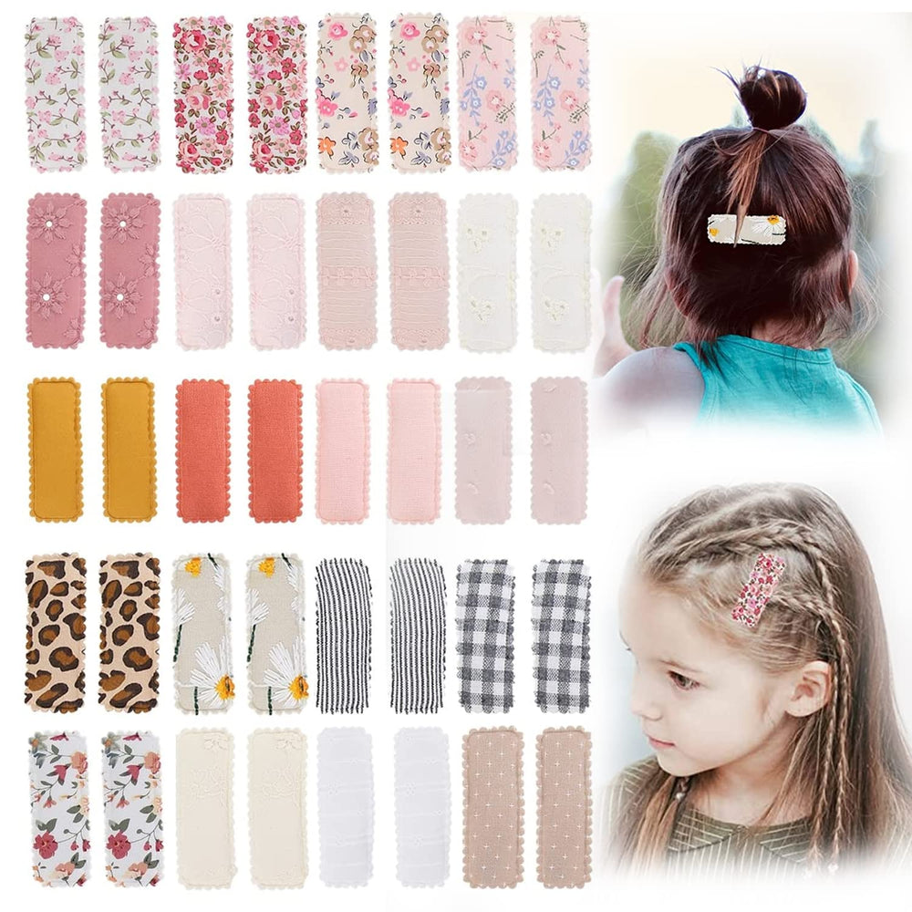 Kidocheese flower-patterns snap hair clip wrapped in cloth for secure, gentle hold.