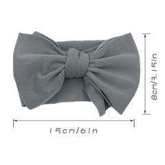 KIDOCHEESE hairband soft-silk-cotton-nylon emphasizes gentle comfort for delicate heads.