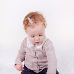 KIDOCHEESE soft cotton-wrapped clip ensures gentle hold for delicate baby hair