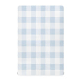 Kigai blue gingham crib sheet on mattress with secure elastic fit for a smooth sleep surface.