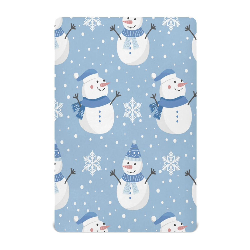 Kigai Christmas snowman crib sheet with snowflakes creates a cozy nursery ambiance.
