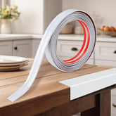 Kikerike corner protector with peel-and-stick white finish protects furniture edges.