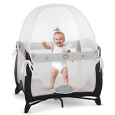 Kindersense Pack N Play Tent over a playpen with a clear, breathable mesh top for safe supervision.