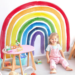Kingarch Rainbow Wall Decal with four stripes brightens a nursery wall and is easily removable.