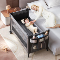 Kingobabys bedside bassinet with diaper changer provides convenient night-time access.