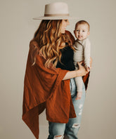 Kishu Baby Indi rust nursing cover front view shows breathable muslin for privacy