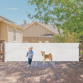 KISKIZ 140-inch gate in a wide doorway showing versatile protection for kids and pets.