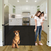 KISKIZ 55-inch retractable gate extended in doorway for flexible barrier.