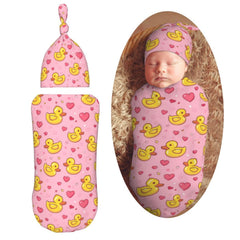 KiuLoam pink yellow heart duck swaddle keeps baby snug and promotes calm sleep.