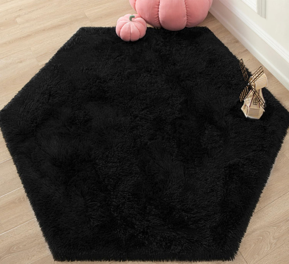 KIXINWA Black Hexagon Rug closeup showing plush surface for soft, comfortable feet