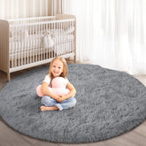KIXINWA round rug with soft fluffy surface for cozy feet in the bedroom