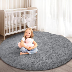 KIXINWA round rug with soft fluffy surface for cozy feet in the bedroom
