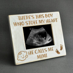 K KENON frame featuring Winnie the Pooh sonogram for newborn keepsakes.