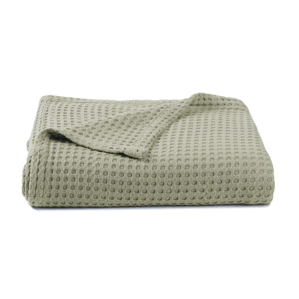Kloovete Sage waffle weave blanket close-up, showcasing soft texture and breathability.