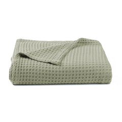 Kloovete Sage waffle weave blanket close-up, showcasing soft texture and breathability.