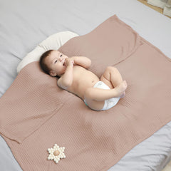 Kloovete baby blanket ready for swaddle and nursery use in clay