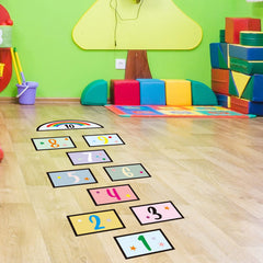 KMOTASUO wall and floor decal adheres safely to smooth surfaces.