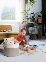 Kodomoore blanket basket handles wrapped in cotton for easy, comfortable carrying.