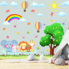 KOKOLAP bear on a rainbow forest wall decal brightens a kid's room.