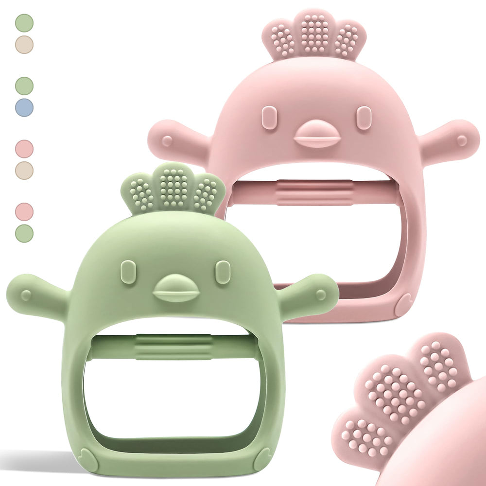 Komfy LilLove teether mitten on a baby's hand showing secure grip for tiny hands