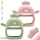 Komfy LilLove teether mitten on a baby's hand showing secure grip for tiny hands