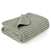 Konssy Amy Green waffle blanket front view, soft and warm.