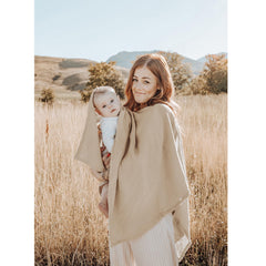 Konssy car-seat cover doubles as a stroller shield.