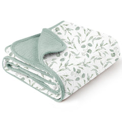 Konssy muslin blanket with green leaves pattern for soft, breathable baby warmth.