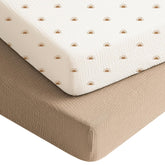 Konssy muslin crib sheets two-pack provides a soft, breathable sleep surface for baby naps