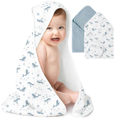 Konssy muslin hooded baby towels in blue whale design, soft and absorbent.