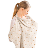 Konssy Muslin nursing cover over baby for discreet feeding.