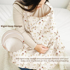 Konssy Posy car seat cover used to shade and protect baby during outings.